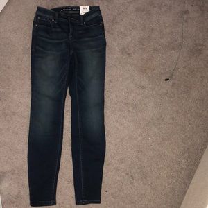 Skinny leg dark jeans